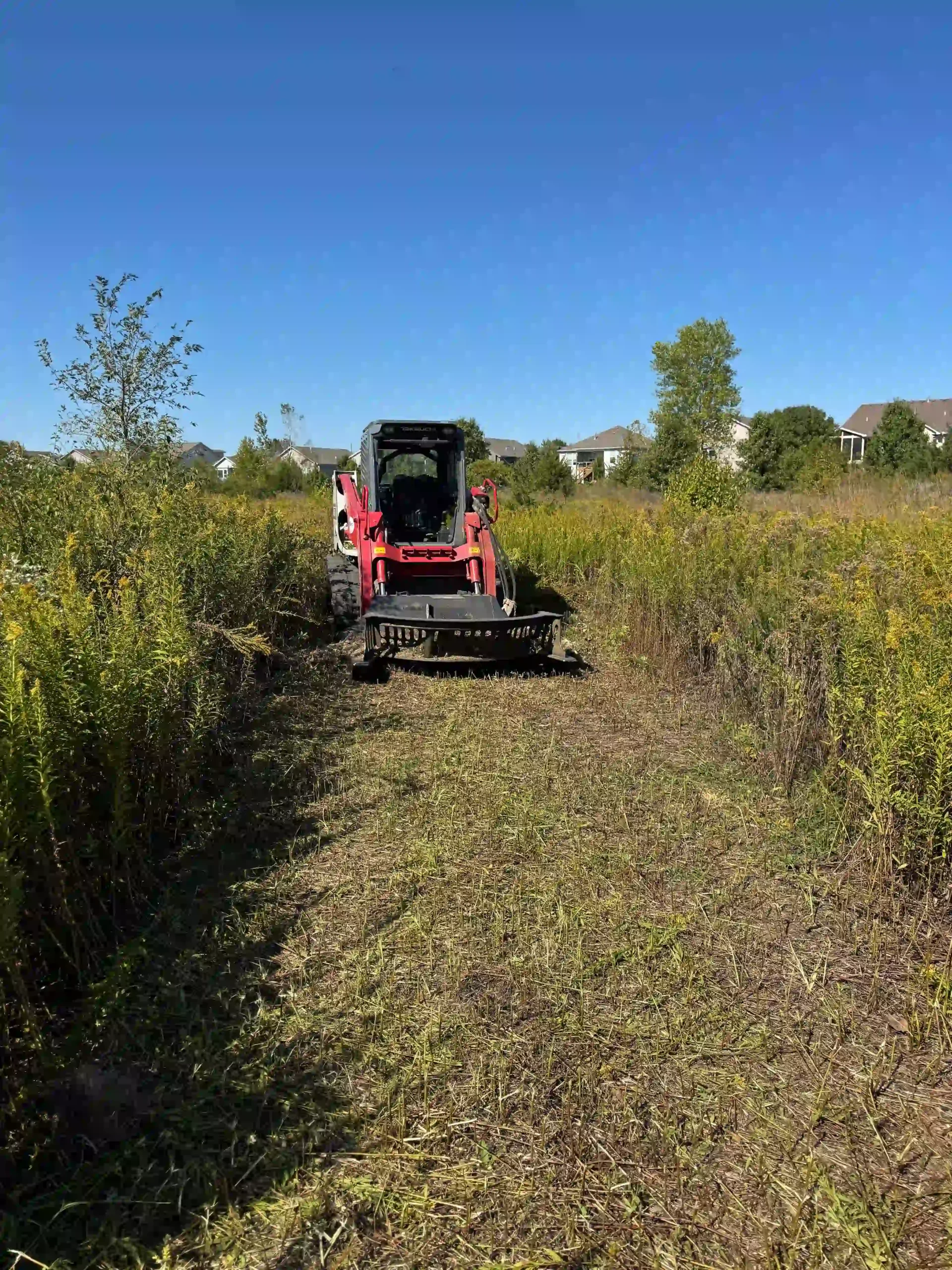 Brush hogging rural acreage near Kingsville Missouri