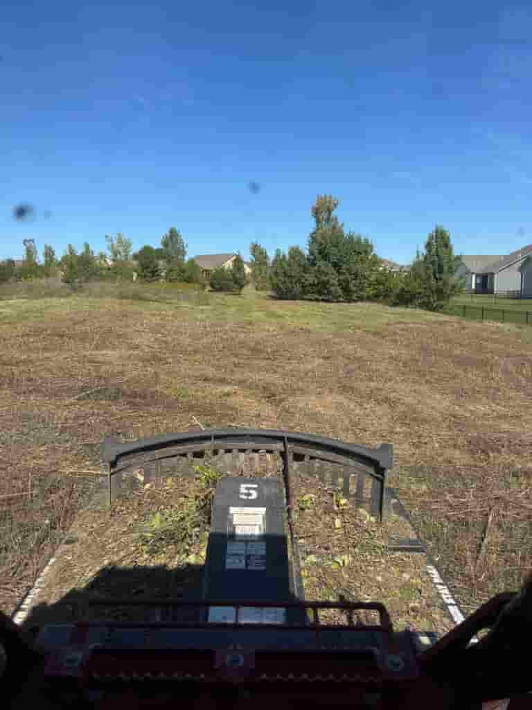 Cleared lot after brush hogging service Solid Ground Kansas City MO
